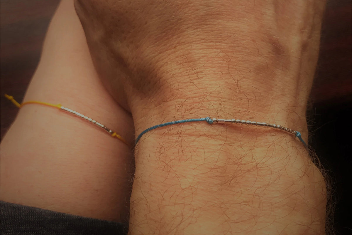 Personalized Morse Code couple bracelets set of 2 with 925 sterling silver beads on black cord.