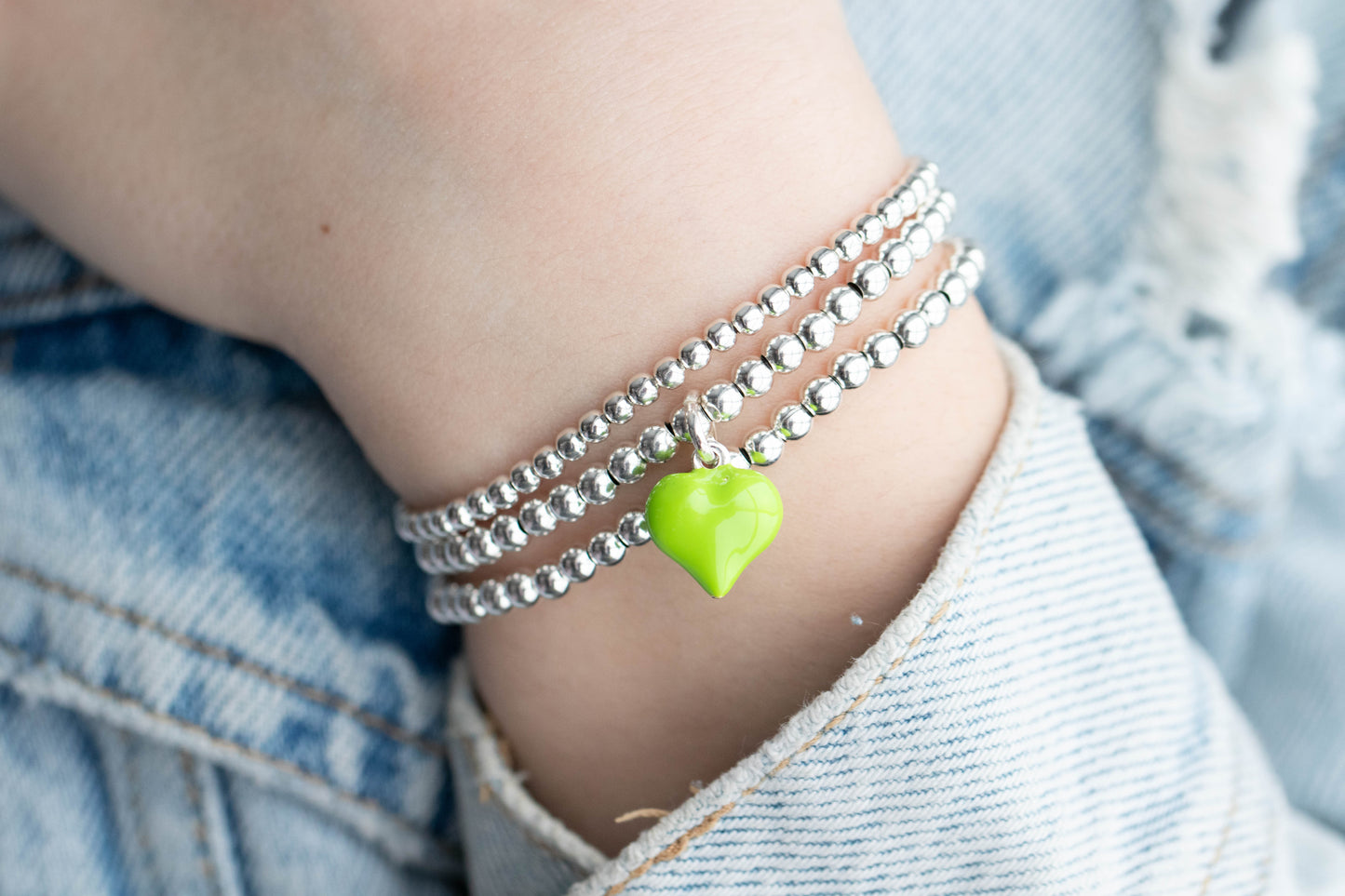 Sterling silver puff heart charm bracelet