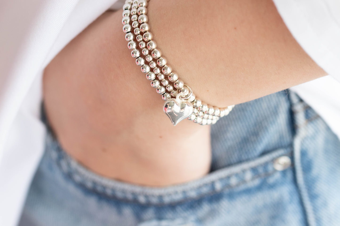 Sterling silver puff heart charm bracelet