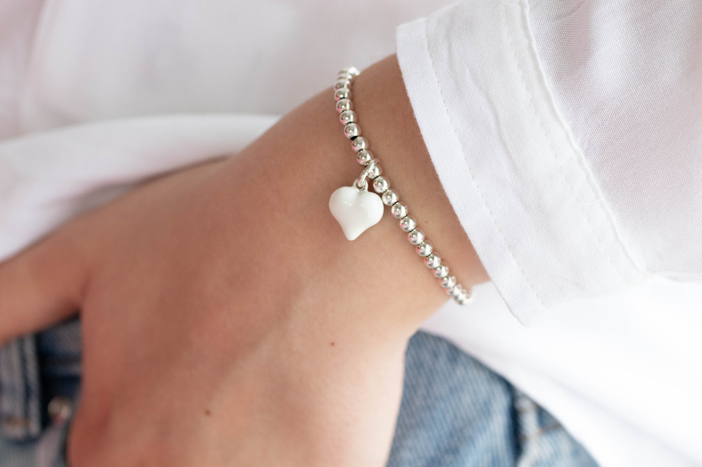 Sterling silver puff heart charm bracelet