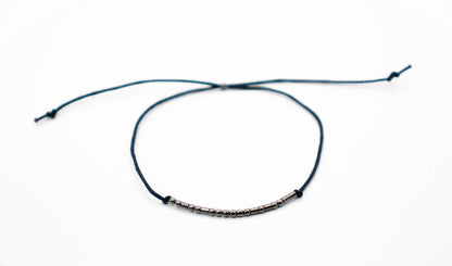 Personalized Morse Code couple bracelets set of 2 with 925 sterling silver beads on black cord.