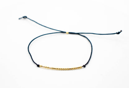 Personalized Morse Code couple bracelets set of 2 with 925 sterling silver beads on black cord.